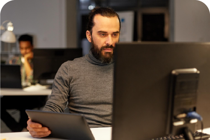 An employee working at their desk